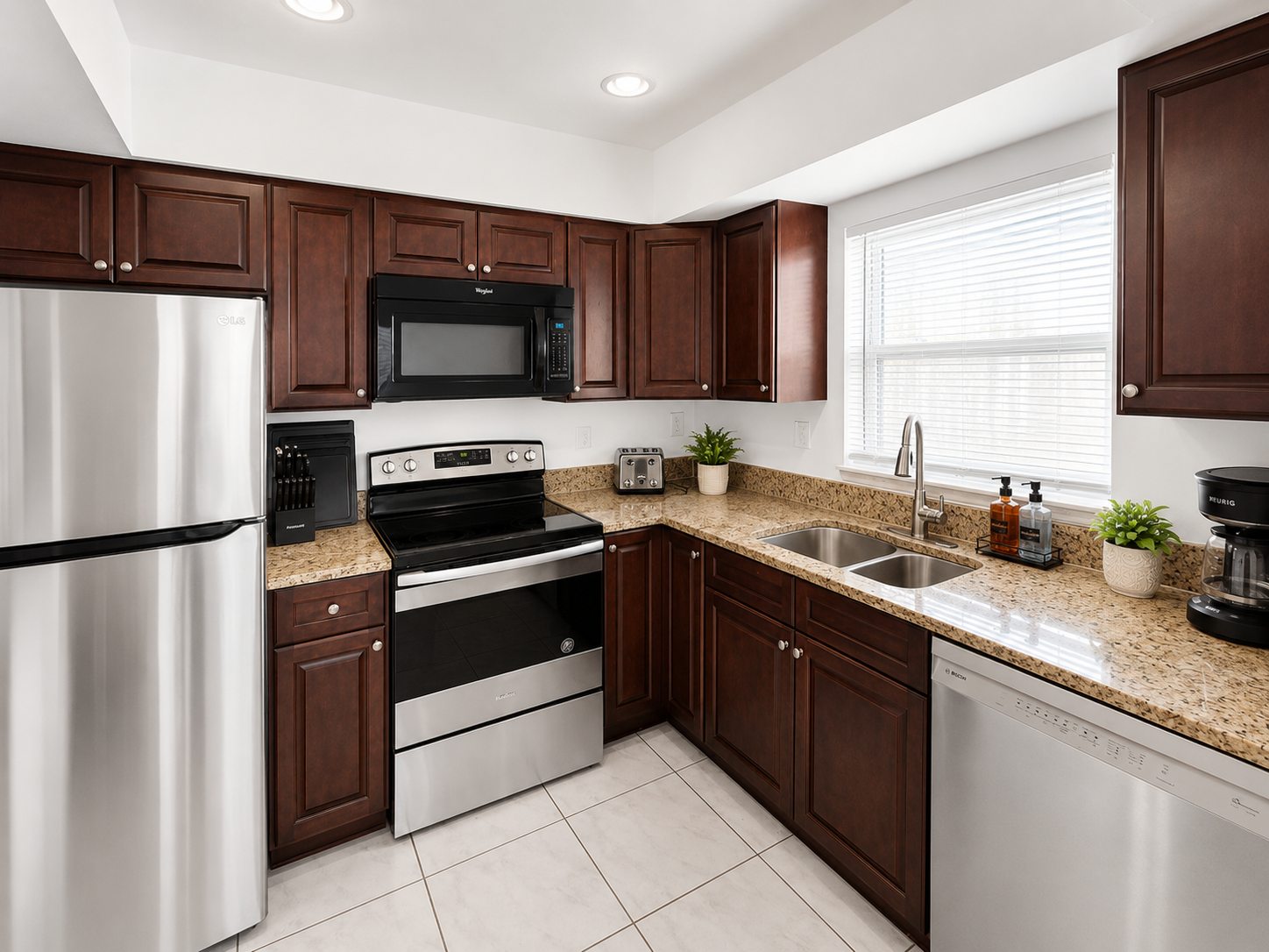 Full kitchen with granite counters in the Boca Raton sober living home