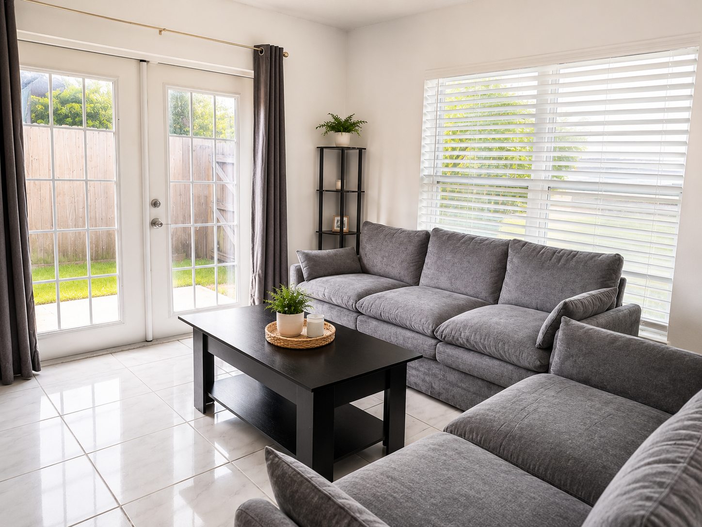 Bright shared living room with sectional sofa