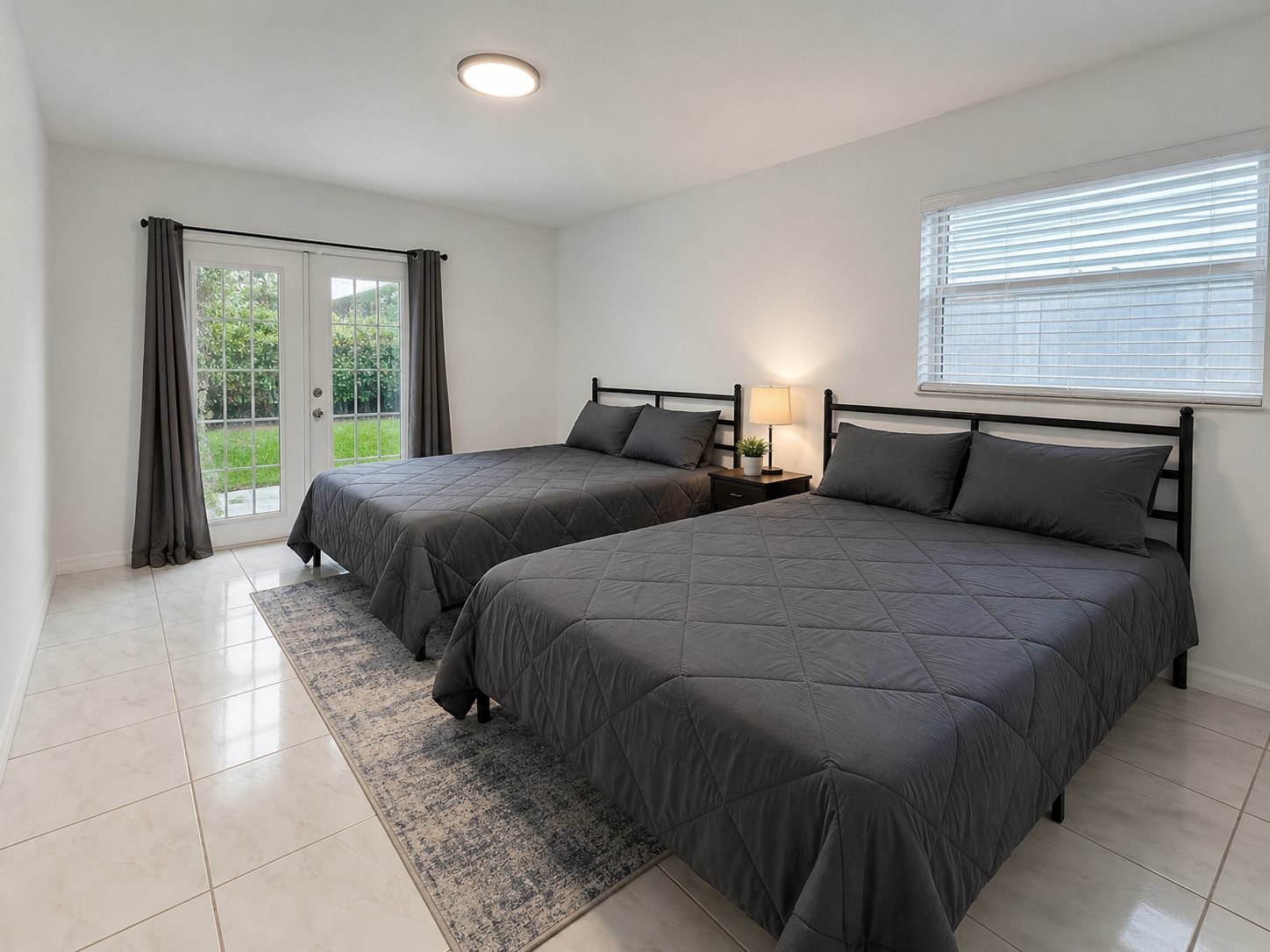 Bright, orderly bedroom in the Anchor & Ascent sober living home